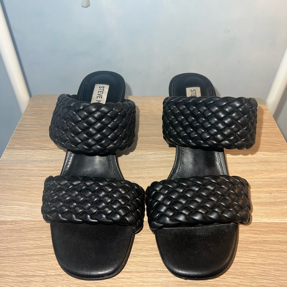 Black Steve Madden heels.